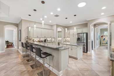 Discover the epitome of luxury living in this stunning 4-bedroom on Pennbrooke Fairways in Florida - for sale on GolfHomes.com, golf home, golf lot