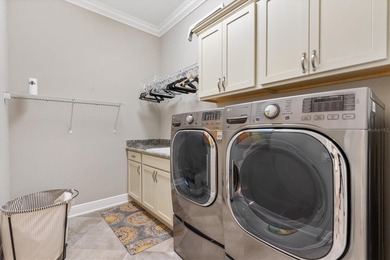 Discover the epitome of luxury living in this stunning 4-bedroom on Pennbrooke Fairways in Florida - for sale on GolfHomes.com, golf home, golf lot