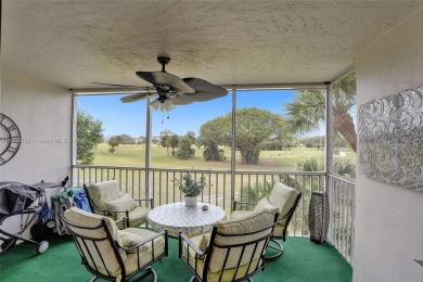 BEAUTIFUL CHARMING 1/1.5 CONDO WITH VIEW OF THE GOLF COURSE on Palm-Aire Country Club and Resort - Palms in Florida - for sale on GolfHomes.com, golf home, golf lot