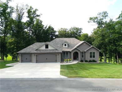 Price improvement! Infinity Homes, beautifully built home sits on Osage National Golf Club in Missouri - for sale on GolfHomes.com, golf home, golf lot