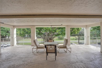 BEAUTIFUL CHARMING 1/1.5 CONDO WITH VIEW OF THE GOLF COURSE on Palm-Aire Country Club and Resort - Palms in Florida - for sale on GolfHomes.com, golf home, golf lot