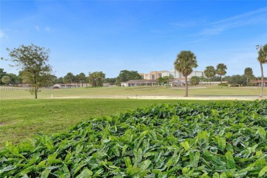 BEAUTIFUL CHARMING 1/1.5 CONDO WITH VIEW OF THE GOLF COURSE on Palm-Aire Country Club and Resort - Palms in Florida - for sale on GolfHomes.com, golf home, golf lot