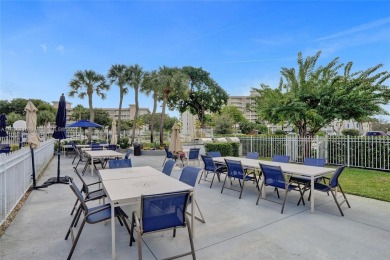 BEAUTIFUL CHARMING 1/1.5 CONDO WITH VIEW OF THE GOLF COURSE on Palm-Aire Country Club and Resort - Palms in Florida - for sale on GolfHomes.com, golf home, golf lot