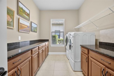 Elegant and Expansive Mercede Model with Golf  Water Views in on Esplanade Golf and Country at Lakewood Ranch in Florida - for sale on GolfHomes.com, golf home, golf lot