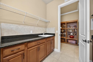 Elegant and Expansive Mercede Model with Golf  Water Views in on Esplanade Golf and Country at Lakewood Ranch in Florida - for sale on GolfHomes.com, golf home, golf lot