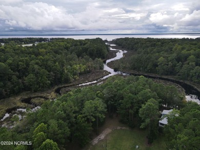 A beautifully, wooded lot with Creek views. Situated at the back on Minnesott Golf and Country Club in North Carolina - for sale on GolfHomes.com, golf home, golf lot