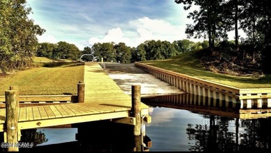 A beautifully, wooded lot with Creek views. Situated at the back on Minnesott Golf and Country Club in North Carolina - for sale on GolfHomes.com, golf home, golf lot