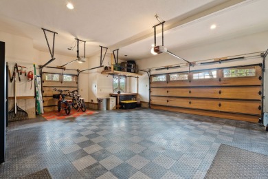 If you want beautiful Swan Mountain views from almost every room on Eagle Bend Golf Course in Montana - for sale on GolfHomes.com, golf home, golf lot