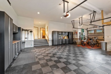 If you want beautiful Swan Mountain views from almost every room on Eagle Bend Golf Course in Montana - for sale on GolfHomes.com, golf home, golf lot