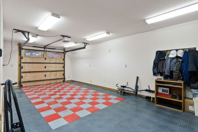 If you want beautiful Swan Mountain views from almost every room on Eagle Bend Golf Course in Montana - for sale on GolfHomes.com, golf home, golf lot