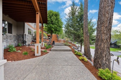 If you want beautiful Swan Mountain views from almost every room on Eagle Bend Golf Course in Montana - for sale on GolfHomes.com, golf home, golf lot