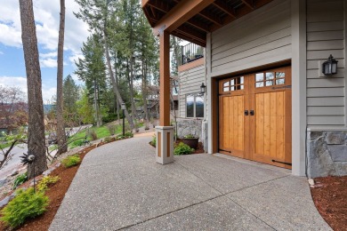 If you want beautiful Swan Mountain views from almost every room on Eagle Bend Golf Course in Montana - for sale on GolfHomes.com, golf home, golf lot