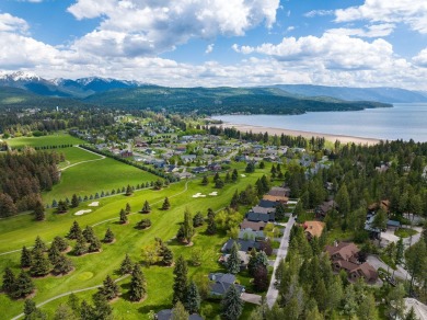 If you want beautiful Swan Mountain views from almost every room on Eagle Bend Golf Course in Montana - for sale on GolfHomes.com, golf home, golf lot