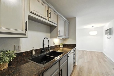 Welcome to this beautifully updated 2-bedroom, 1-bath condo on Colina Park Golf Course in California - for sale on GolfHomes.com, golf home, golf lot