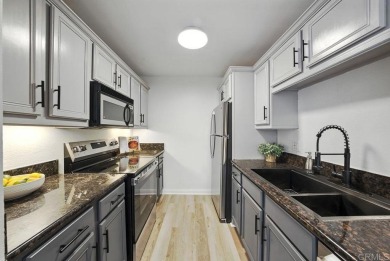 Welcome to this beautifully updated 2-bedroom, 1-bath condo on Colina Park Golf Course in California - for sale on GolfHomes.com, golf home, golf lot