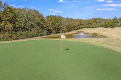 Discover a newer home opposite Hartwell Lake, boasting seasonal on The Trail At Chickasaw Pointe in South Carolina - for sale on GolfHomes.com, golf home, golf lot