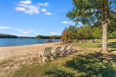 Discover a newer home opposite Hartwell Lake, boasting seasonal on The Trail At Chickasaw Pointe in South Carolina - for sale on GolfHomes.com, golf home, golf lot