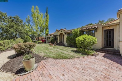 Immerse yourself in beauty! Perched on a 13,860 square foot lot on Orinda Country Club in California - for sale on GolfHomes.com, golf home, golf lot