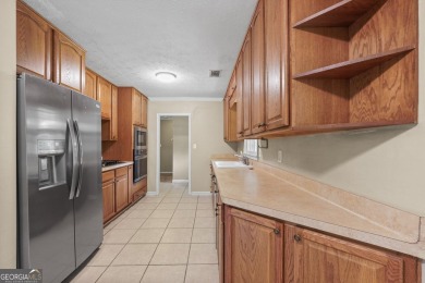 Charming 3BR/2BA Brick Ranch in Prime Peachtree City Location! on Canongate At Flat Creek Club in Georgia - for sale on GolfHomes.com, golf home, golf lot