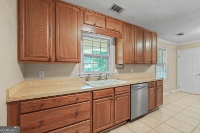 Charming 3BR/2BA Brick Ranch in Prime Peachtree City Location! on Canongate At Flat Creek Club in Georgia - for sale on GolfHomes.com, golf home, golf lot