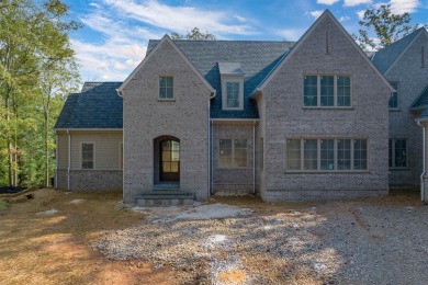 Nestled behind the gates of Reynolds, this stunning new custom on Reynolds Lake Oconee - The Oconee in Georgia - for sale on GolfHomes.com, golf home, golf lot