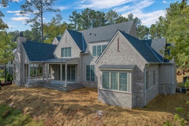 Nestled behind the gates of Reynolds, this stunning new custom on Reynolds Lake Oconee - The Oconee in Georgia - for sale on GolfHomes.com, golf home, golf lot