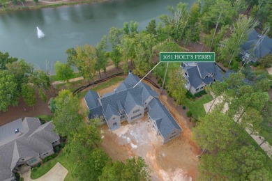 Nestled behind the gates of Reynolds, this stunning new custom on Reynolds Lake Oconee - The Oconee in Georgia - for sale on GolfHomes.com, golf home, golf lot