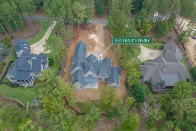 Nestled behind the gates of Reynolds, this stunning new custom on Reynolds Lake Oconee - The Oconee in Georgia - for sale on GolfHomes.com, golf home, golf lot