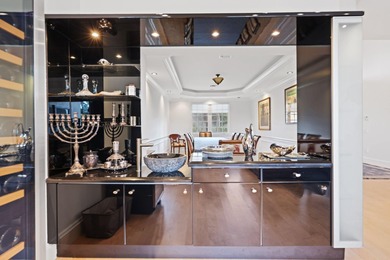 Magnificent Seven bedroom estate home overlooking the 11th on  in Florida - for sale on GolfHomes.com, golf home, golf lot