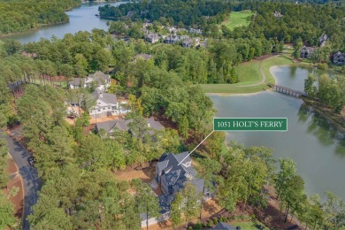 Nestled behind the gates of Reynolds, this stunning new custom on Reynolds Lake Oconee - The Oconee in Georgia - for sale on GolfHomes.com, golf home, golf lot