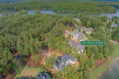 Nestled behind the gates of Reynolds, this stunning new custom on Reynolds Lake Oconee - The Oconee in Georgia - for sale on GolfHomes.com, golf home, golf lot