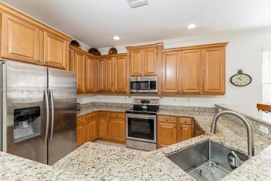 Beautiful GOLF COURSE VIEW villa, located in the DESIRABLE PGA on The Legacy Golf and Tennis Club in Florida - for sale on GolfHomes.com, golf home, golf lot