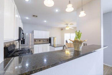 Located in Johnson Ranch community, this stunning two-story home on The Golf Club At Johnson Ranch in Arizona - for sale on GolfHomes.com, golf home, golf lot
