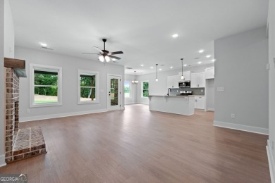 All Brick 5-BEDROOM home 3,213 sq. ft.  in prestigious Lake Dow on Canongate At Georgia National Golf Club in Georgia - for sale on GolfHomes.com, golf home, golf lot