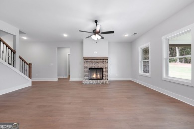 All Brick 5-BEDROOM home 3,213 sq. ft.  in prestigious Lake Dow on Canongate At Georgia National Golf Club in Georgia - for sale on GolfHomes.com, golf home, golf lot