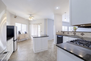 Located in Johnson Ranch community, this stunning two-story home on The Golf Club At Johnson Ranch in Arizona - for sale on GolfHomes.com, golf home, golf lot
