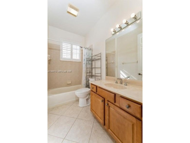 Beautiful GOLF COURSE VIEW villa, located in the DESIRABLE PGA on The Legacy Golf and Tennis Club in Florida - for sale on GolfHomes.com, golf home, golf lot