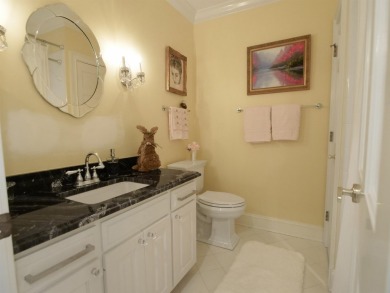This traditional 1.5 story brick home with finished basement is on The Carolina Country Club in South Carolina - for sale on GolfHomes.com, golf home, golf lot