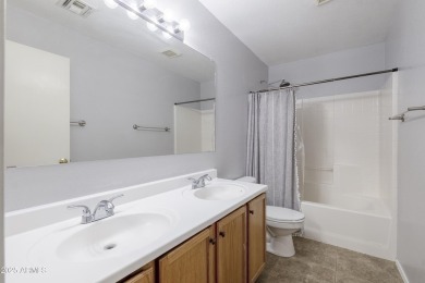 Located in Johnson Ranch community, this stunning two-story home on The Golf Club At Johnson Ranch in Arizona - for sale on GolfHomes.com, golf home, golf lot