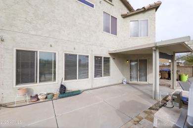 Located in Johnson Ranch community, this stunning two-story home on The Golf Club At Johnson Ranch in Arizona - for sale on GolfHomes.com, golf home, golf lot