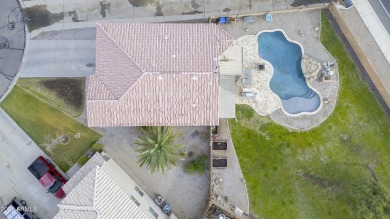 Located in Johnson Ranch community, this stunning two-story home on The Golf Club At Johnson Ranch in Arizona - for sale on GolfHomes.com, golf home, golf lot