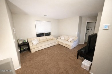 Opportunity awaits in this 3-bedroom, 2.5-bath home featuring a on Poston Butte Golf Club in Arizona - for sale on GolfHomes.com, golf home, golf lot