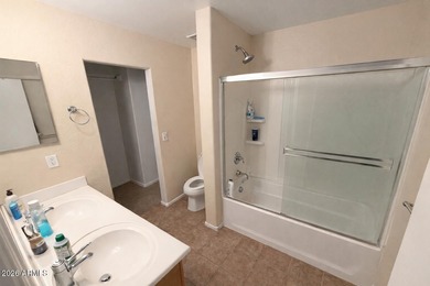 Opportunity awaits in this 3-bedroom, 2.5-bath home featuring a on Poston Butte Golf Club in Arizona - for sale on GolfHomes.com, golf home, golf lot