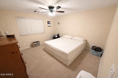 Opportunity awaits in this 3-bedroom, 2.5-bath home featuring a on Poston Butte Golf Club in Arizona - for sale on GolfHomes.com, golf home, golf lot