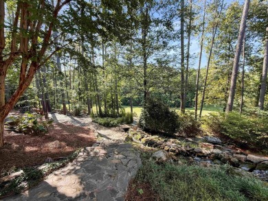 This traditional 1.5 story brick home with finished basement is on The Carolina Country Club in South Carolina - for sale on GolfHomes.com, golf home, golf lot