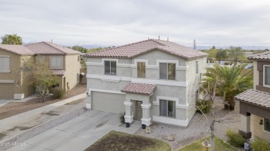 Located in Johnson Ranch community, this stunning two-story home on The Golf Club At Johnson Ranch in Arizona - for sale on GolfHomes.com, golf home, golf lot