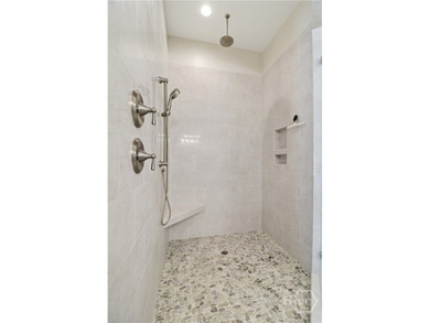 Experience refined living in one of the area's most sought after on Savannah Quarters Country Club in Georgia - for sale on GolfHomes.com, golf home, golf lot