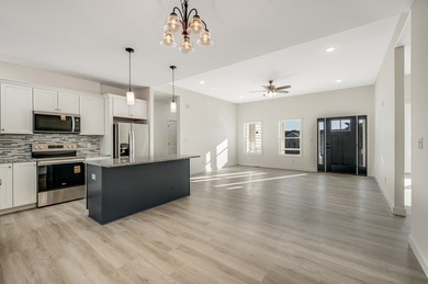 NEW CONSTRUCTION in Captain's Cove Golf & Yacht Club - & it's on Captains Cove Golf and Yacht Club in Virginia - for sale on GolfHomes.com, golf home, golf lot