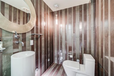 Beautifully remodeled oversized 2 bed, 2.5 bath in South Beach's on Miami Beach Golf Club in Florida - for sale on GolfHomes.com, golf home, golf lot