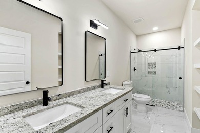 MODERN LUXURY LIVING AT LAKE ROYALE! This custom-built 3BR/3BA on River Golf and County Club at Lake Royale in North Carolina - for sale on GolfHomes.com, golf home, golf lot